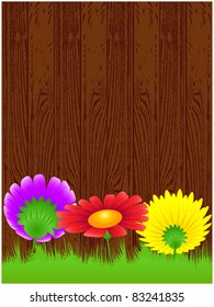 Wood with a dark background located on it flowers and green grass