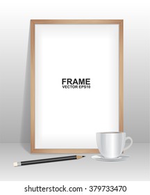 Wood frame with coffee and pencil