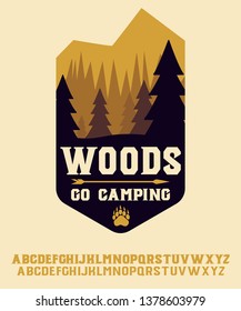 Wood. Go camping. Hand made badge in flat style. Hand made typeface. Serif font. Vintage badge.