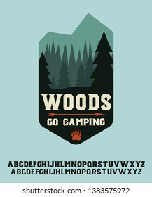 Wood. Go camping. Hand made badge in flat style. Hand made typeface. Serif font. Vintage badge.