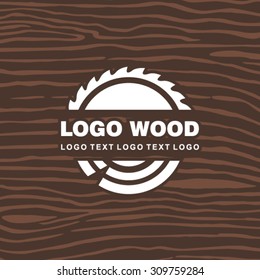 Wood industry symbol with saw and tree rings