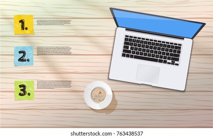 Wood table with home computer and cup of coffee in early morning