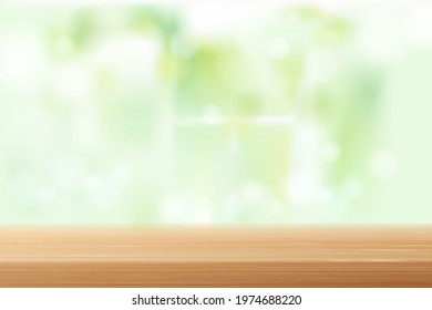 Wood table top blur Behind the window in the room white and green background.
It can be used to display merchandise, food, other products.