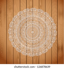 wood texture with a lace cloth