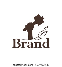 Woodcarving logotype Illustration with hand holding a hammer icon. Vintage style logo, engraving logo. Wood engraver logo design