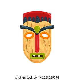 Wooden african mask with green gem in forehead isolated on white background
