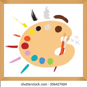 Wooden art palette with paints and brush strokes