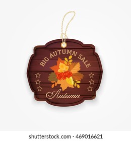 Wooden autumn sale badge with autumn leaves bunch in vintage style. Vector illustration.