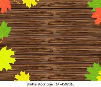 Wooden background with autumn leaves