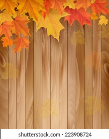 Wooden background with autumn leaves. Vector.