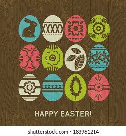 wooden background with color easter eggs, vector illustration