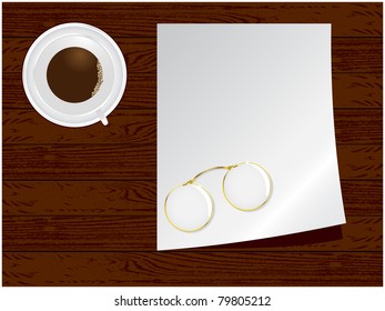 Wooden background with a cup of coffee, a sheet of white paper and glasses