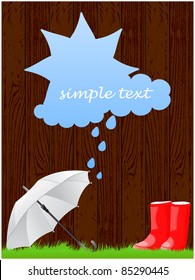 Wooden background with green grass, red rubber boots, umbrella and a cloud for title