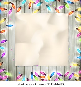 Wooden background with light bulbs and old paper. EPS 10 vector file included