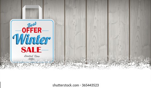 Wooden background with snowflakes and shopping bag for winter sale. Eps 10 vector file.