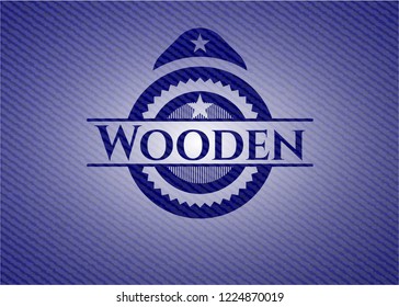 Wooden badge with denim background