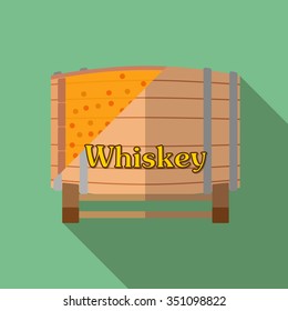 Wooden barrel with whiskey.