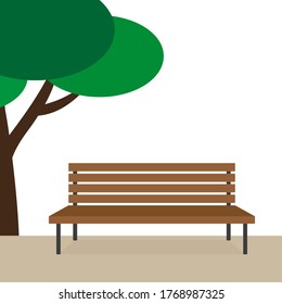 Wooden bench under the tree