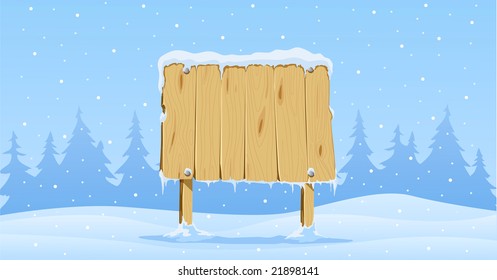 wooden blank board in snow on winter background with fir-trees