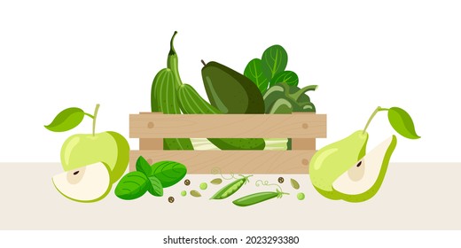 Wooden box with green vegetables, fruits, greens. Green halthy food in wooden box isolated on white. Fresh organic food for menu, banner for healthy eating. Eat colors for your health. Rainbow food