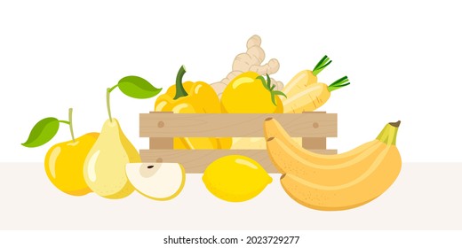 Wooden box with yellow vegetables and fruits. Yellow halthy food in wooden box isolated on white. Fresh organic food for menu, banner . Eat colors for your health. Rainbow of fruits and vegetables