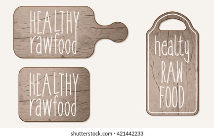 Wooden breadboard and inscription healthy raw product