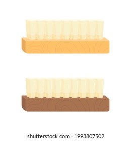 Wooden brush for hair or clothes isolated on beige background. ECO friendly concept. 