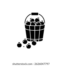Wooden Bucket Filled with Freshly Picked Apples and Fallen Apples on the Ground
