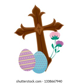 wooden catholic cross with eggs of easter