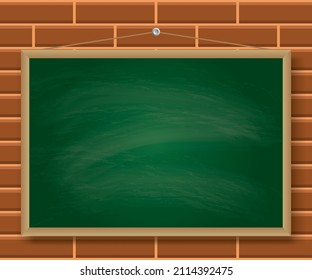 Wooden chalkboard hanging on a brick wall 