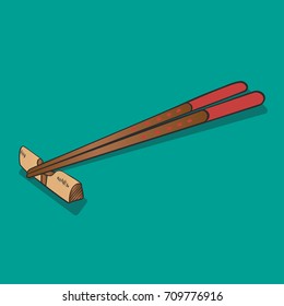 Wooden Chopsticks isolated on green.