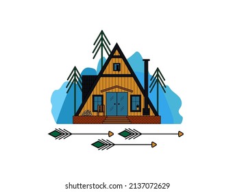 Wooden cozy a-frame house with a cat. Modern teeny house with a fireplace on the background of mountains