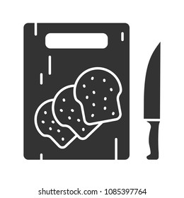 Wooden cutting board with sliced bread glyph icon. Silhouette symbol. Negative space. Vector isolated illustration