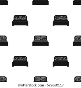 Wooden double bed icon in black style isolated on white background. Furniture and home interior symbol stock vector illustration.