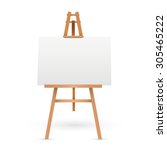 Wooden easel with blank canvas