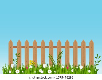 A wooden fence, a hedge near with a flower bed. Scene, landscape in the village or in the country. Garden and garden tools. Flat vector illustration.