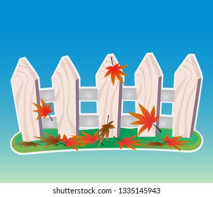 Wooden fence and maple leaves