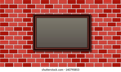marco de madera sobre una pared de ladrillo