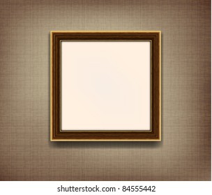 Wooden frame for photo on the  fabric background