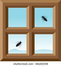 A wooden frame of a window, a view of the blue sky and mountains, and two flies on glass