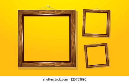 wooden frames on the yellow wall. vector illustration. cut paper design frame.