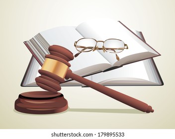 wooden gavel, glasses and books 