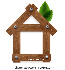 Wooden house and green leaves