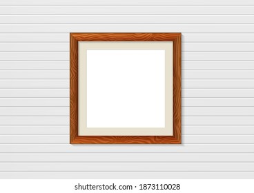 Wooden photo frame mockup on wall. Interior decoration