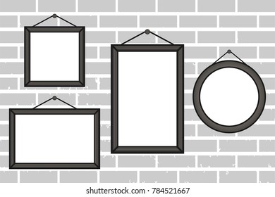 Wooden photo frame on a brick wall