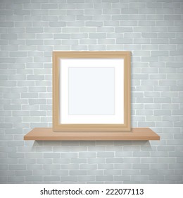 Wooden photo frame and wooden shelf on brick wall texture background.