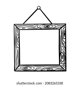 Wooden picture frame hand drawn doodle in vector. Copy space engraved border blank photo label hanging on the wall