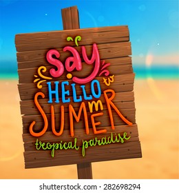 Wooden Plaque with Lettering. Blurred Background. Summer Beach. Sand and Ocean. Blue Sky with Clouds. Summer Design for Beach Party Placard.