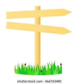 Wooden pointer in the green grass.