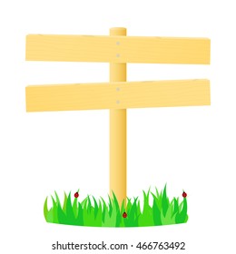 Wooden pointer in the green grass.